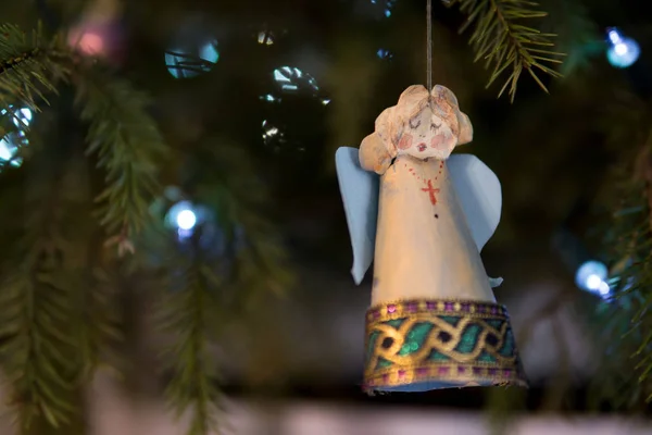 Paper angel on christmas tree — Stock Photo, Image