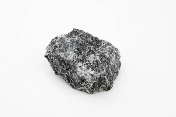 Gabro na białym tle nad białe skały magmowe — Zdjęcie stockowe