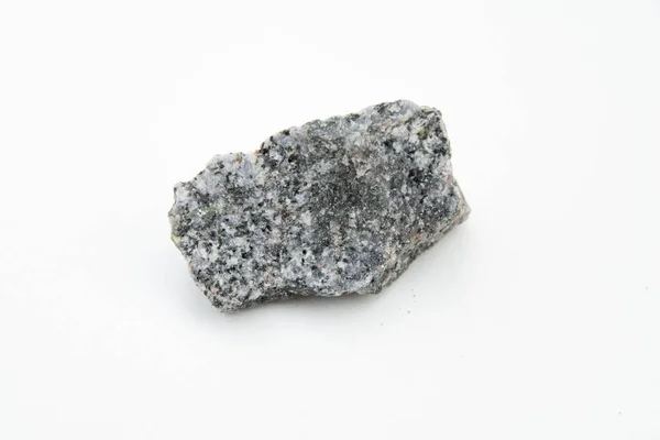 Piedra de diorita de cuarzo aislada sobre blanco — Foto de Stock