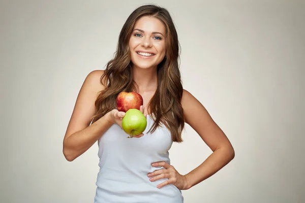 Young woman holding apples. red and green. — Stock Photo, Image