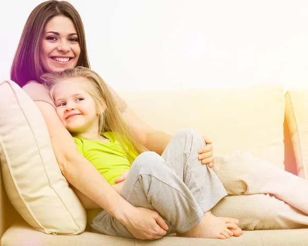 Smiling girl with mother — Stock Photo, Image