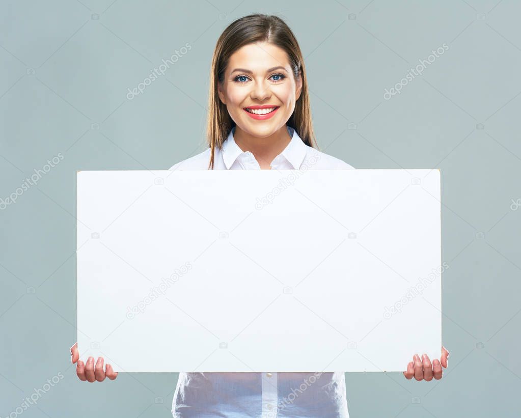 Portrait of business woman holding sign board. 
