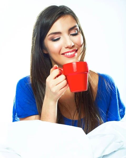 Beautiful woman sitting in bed with closed eyes — Stock Photo, Image