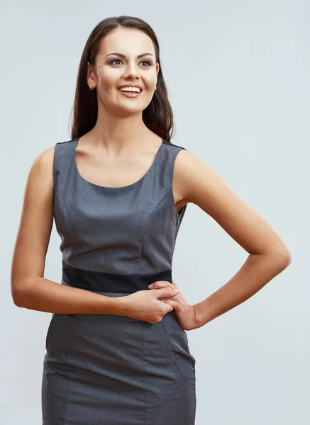 Mujer de negocios sonriendo con los dientes posando sobre fondo gris claro —  Fotos de Stock