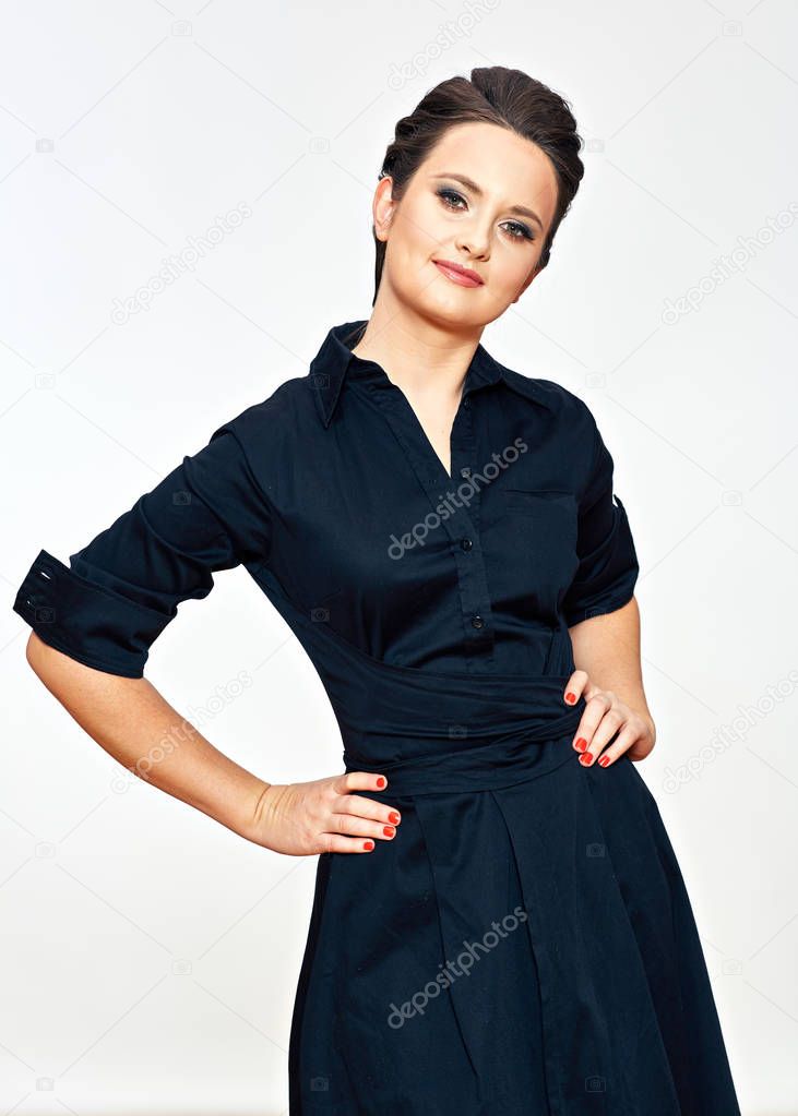 Fashion style photo of young model in black evening dress.