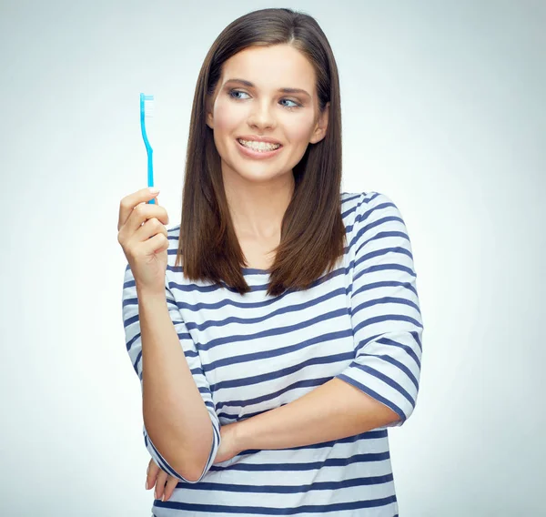 Menina sorridente com cinta escovação dentes . — Fotografia de Stock