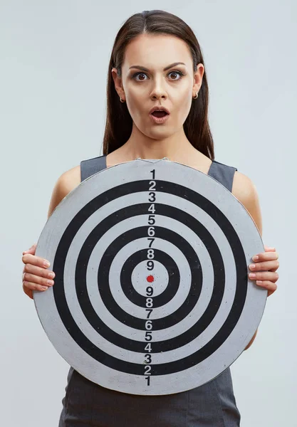 Portrait of emotional business woman holding darts target. — Stock Photo, Image