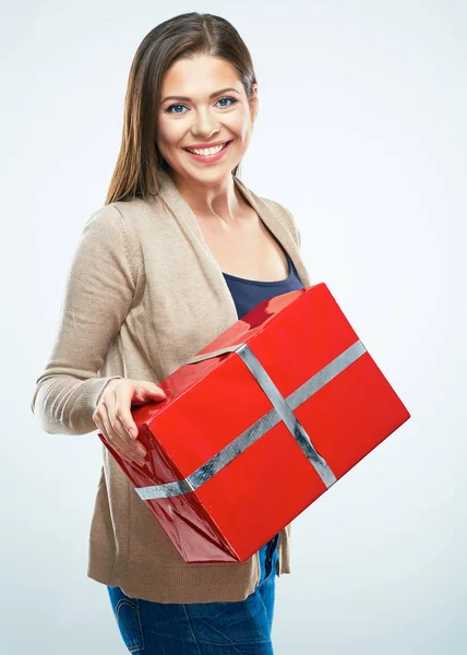 Woman in warm clothes holding box — Stock Photo, Image