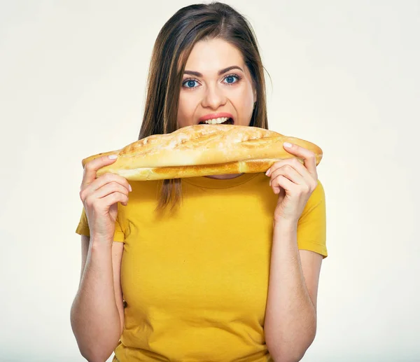 Mujer hambrienta comiendo pan — Foto de Stock