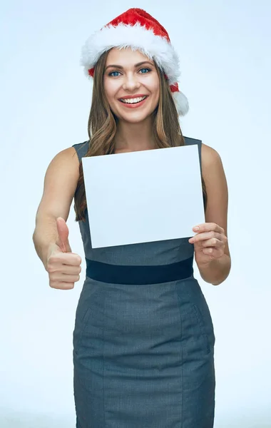 Lächelnde junge Frau mit Weihnachtsmütze — Stockfoto