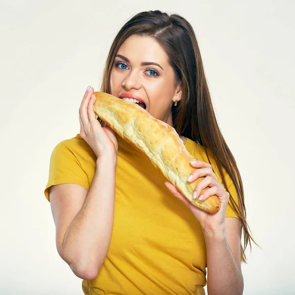 Mujer hambrienta comiendo pan — Foto de Stock