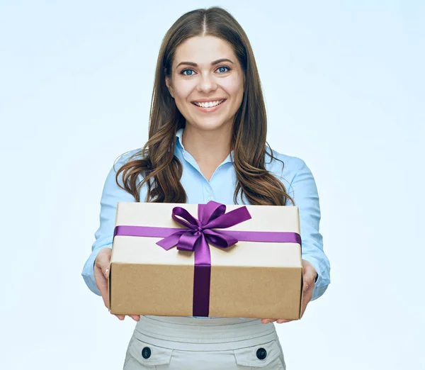 Woman in shirt holding gift box — Stock Photo, Image