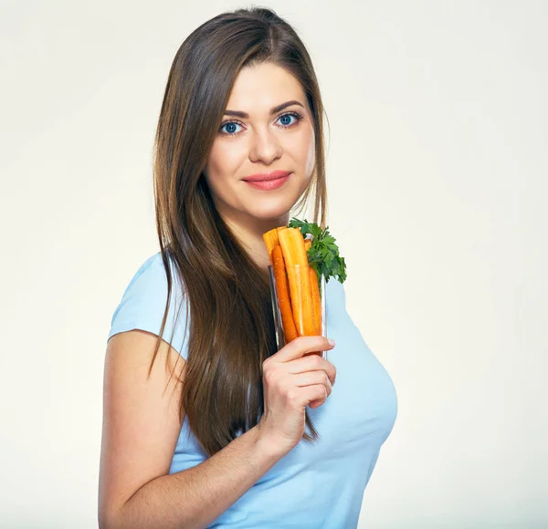 Woman holding glass with carrots — Stock Photo, Image