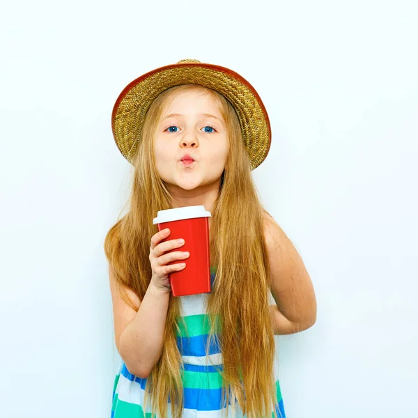 Girl with blond hair holding cup — Stock Photo, Image