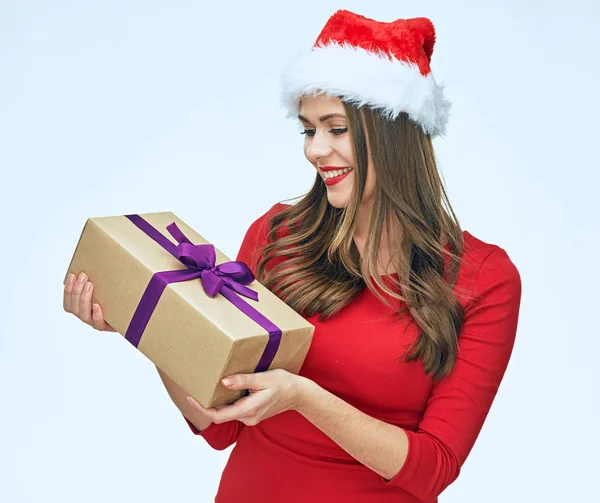 Businesswoman in christmas hat holding box — Stock Photo, Image