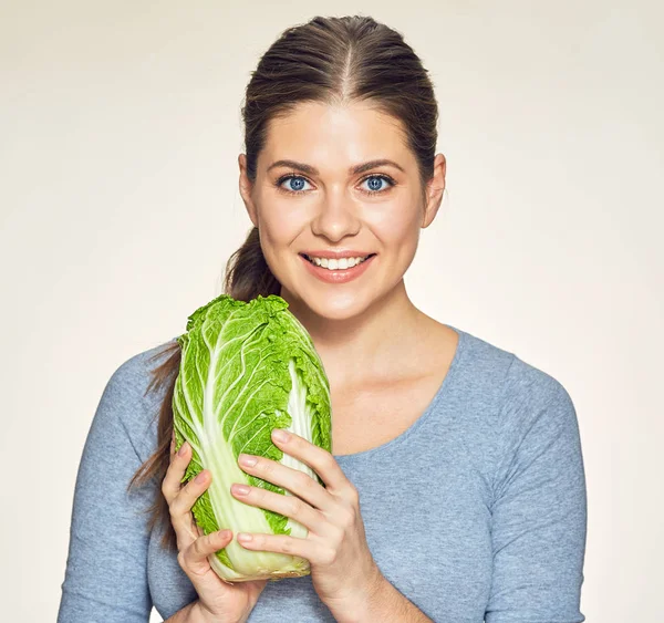 Woman holding green cabbage — Stock Photo, Image