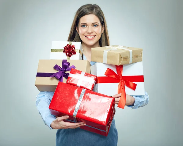 Woman in shirt holding gift boxes — Stock Photo, Image
