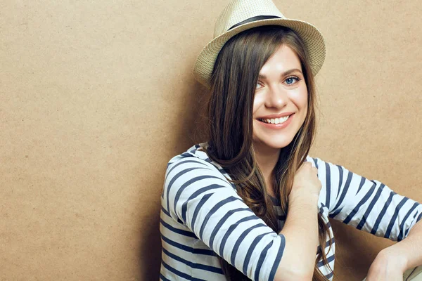 Woman wearing hat and striped shirt — Stock Photo, Image