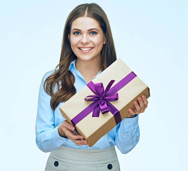 Woman in shirt holding gift box — Stock Photo, Image