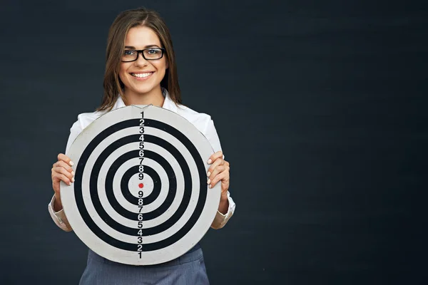 Smiling business woman holding black white target. — Stock Photo, Image