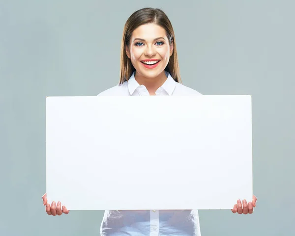 Businesswoman holding blank sign board — Stock Photo, Image