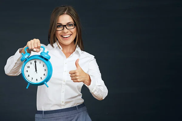 Thumb up. Smiling business woman holding clock. — Stock Photo, Image