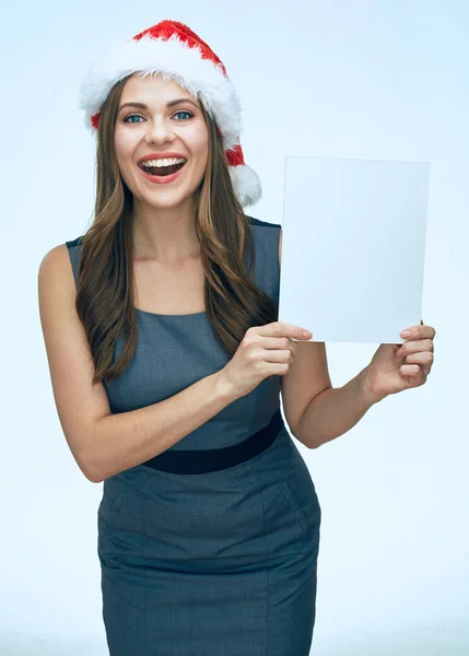 Kvinna i business klänning och santa hatt — Stockfoto