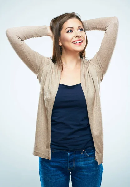 Woman holding hands folded behind head — Stock Photo, Image