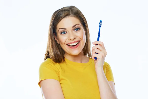 Schöne Frau mit blauer Zahnbürste — Stockfoto