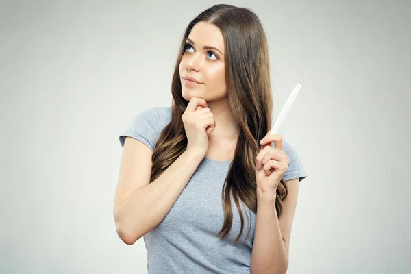 Concept pregnancy photo of young woman holding test. — Stock Photo, Image