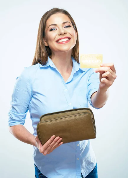 Businesswoman holding credit card and bag — Stock Photo, Image