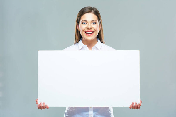 businesswoman holding blank sign board 