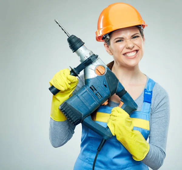 Woman builder holding drill tool — Stock Photo, Image