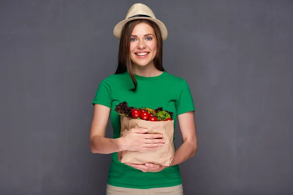 Woman holding vegan food — Stock Photo, Image