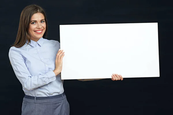 Happy emotional business woman holding white sign board studio p — Stock Photo, Image