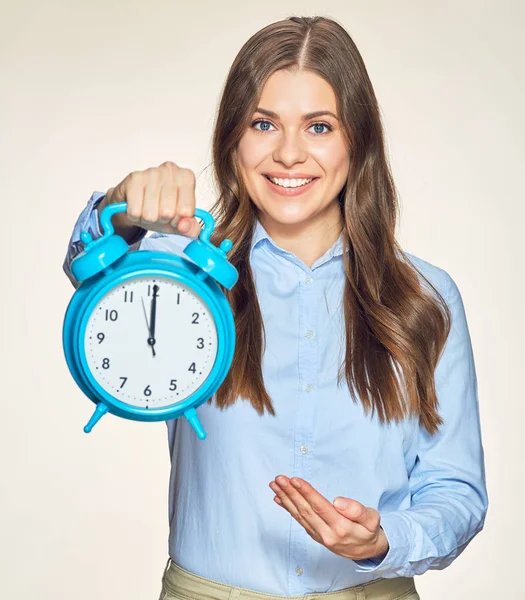 Businesswoman pointing at alarm clock — Stock Photo, Image