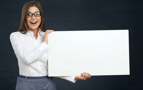 Smiling business woman holding advertising board. — Stock Photo, Image