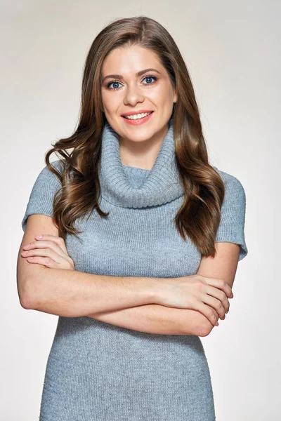 Young smiling woman standing against white isolated background. — Stock Photo, Image