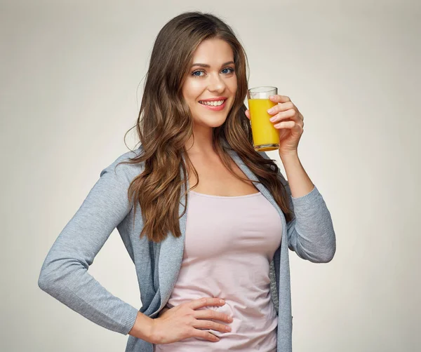Woman holding glass with orange juice — Stock Photo, Image