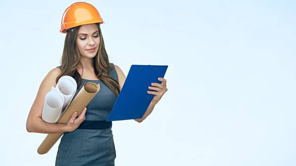 Woman holding paper plans and clipboard — Stock Photo, Image