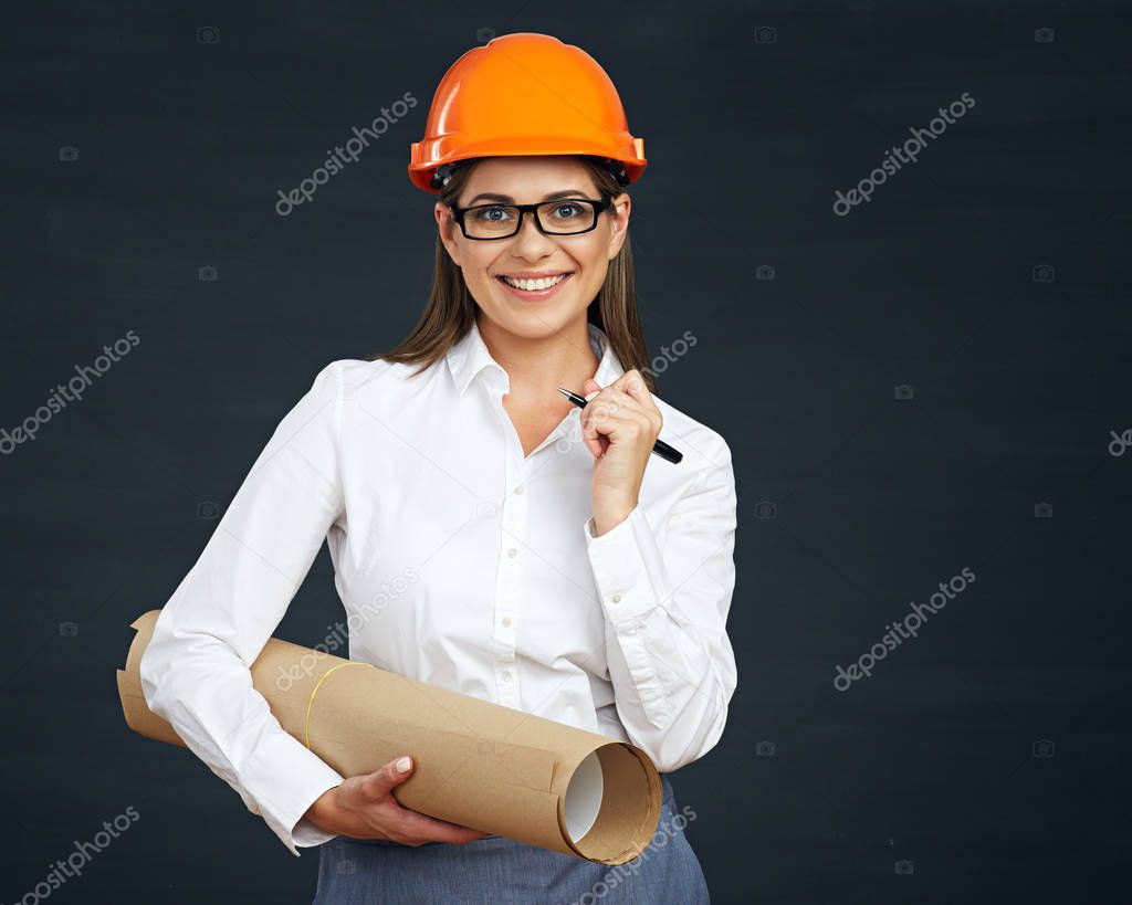 woman architect holding paper blueprint 