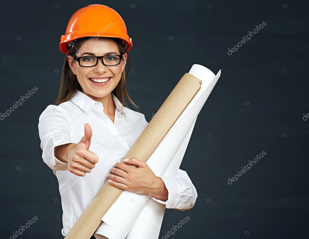 woman architect holding blueprints 