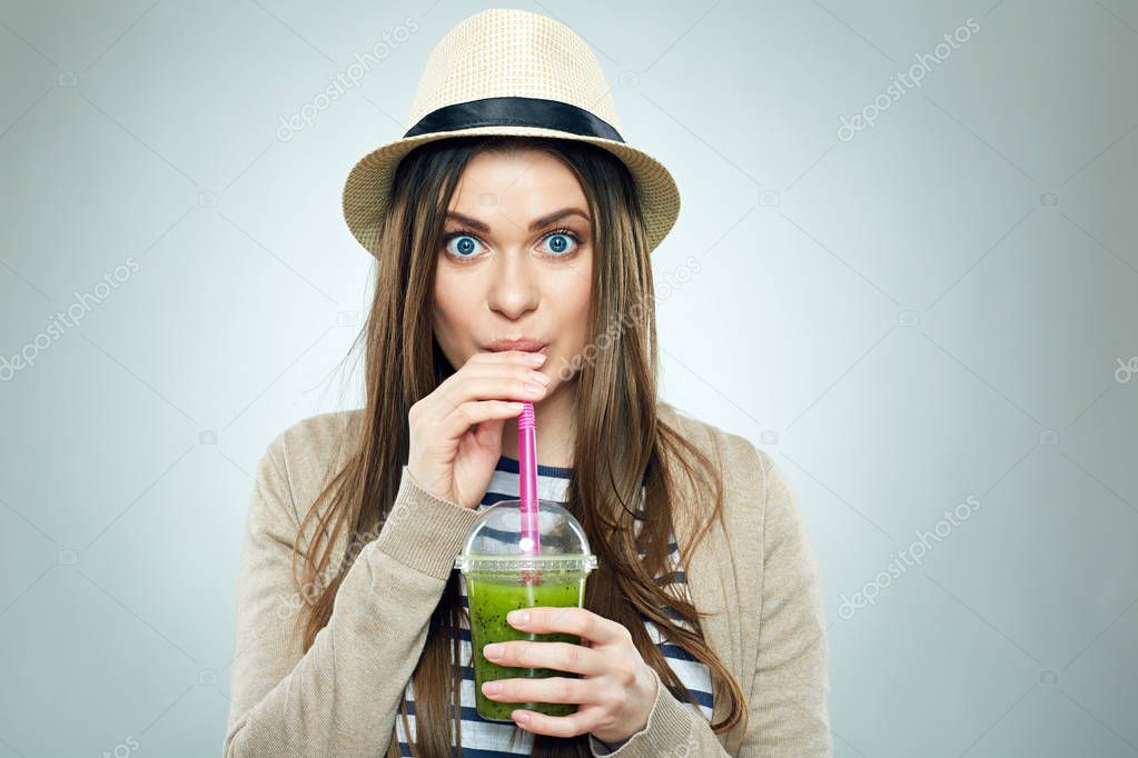 woman holding smoothie drink 