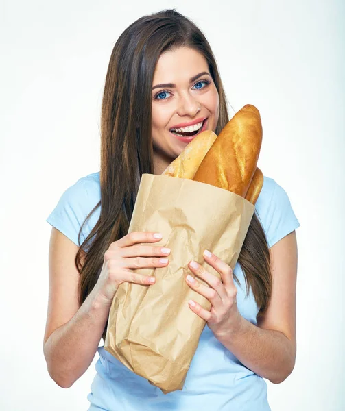 Lachende vrouw bijten brood — Stockfoto