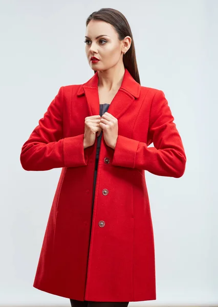 Divat-model, piros kabátot — Stock Fotó