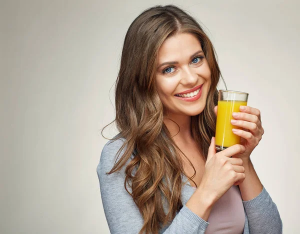 Woman face portrait with orange juice glass. — Stock Photo, Image