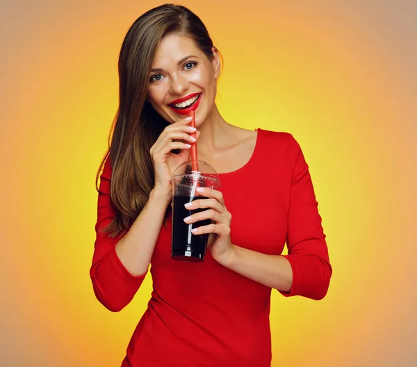 Woman drinking cola. Smiling girl wearing red — Stock Photo, Image