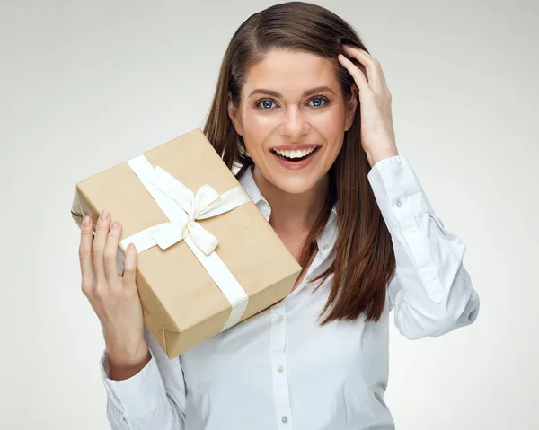 Businesswoman holding big gift box. Isolated portrait — Stock Photo, Image