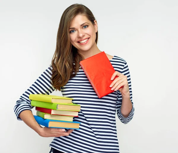 Beautiful girl holding pile of books. — Stock Photo, Image