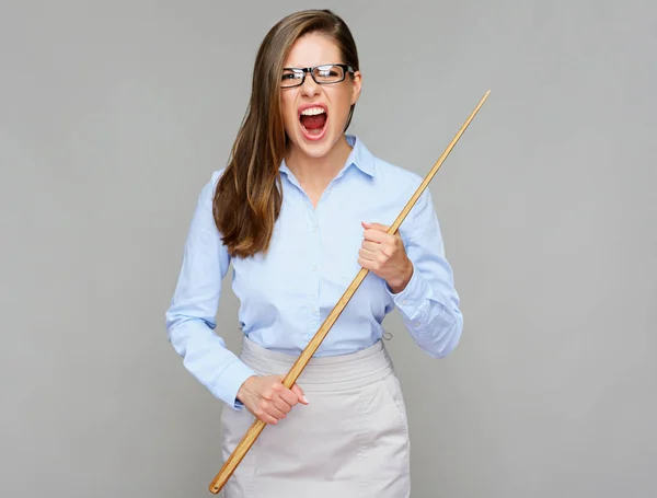 Wicked woman teacher screams, holding pointer wand. — Stock Photo, Image